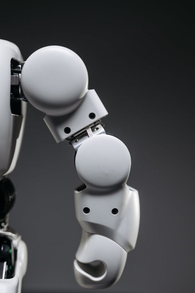 Detailed view of a modern robot arm showcasing advanced robotics technology.